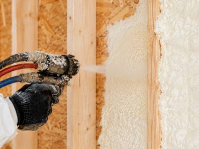 Closed cell foam rising in a stud bay