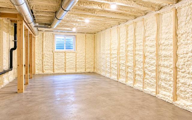 Basement with every foundation wall sealed in closed cell spray foam insulation